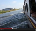 Floods in Thailand, train tries to make its way through waterjj